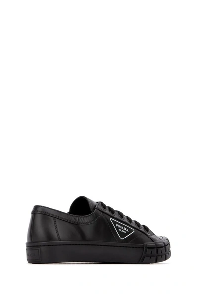 Shop Prada Cassetta Wheel Sneakers In Black