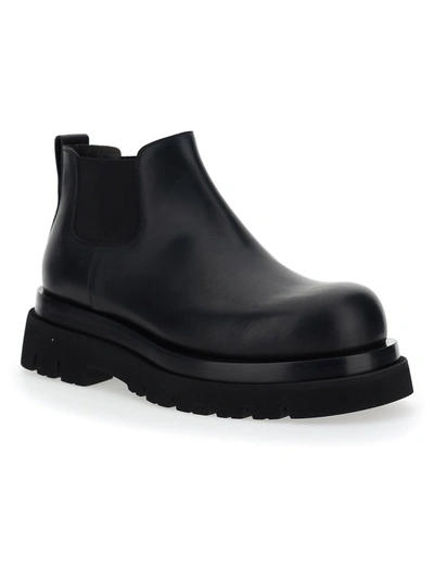 Shop Bottega Veneta The Lug Chelsea Boots In Black