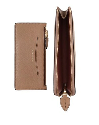 Shop Burberry Wallets In Brown