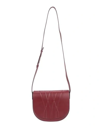 Shop Alesya Orlova Cross-body Bags In Maroon