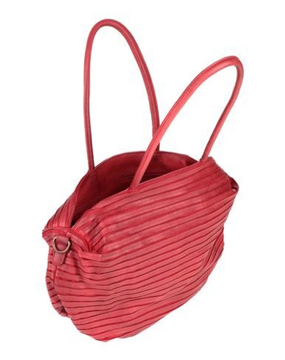 Shop Maury Handbags In Red