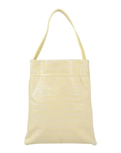 Shop Tl 180 Handbags In Yellow