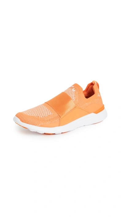 Shop Apl Athletic Propulsion Labs Techloom Bliss Sneakers In Orange/metallic Pearl/white