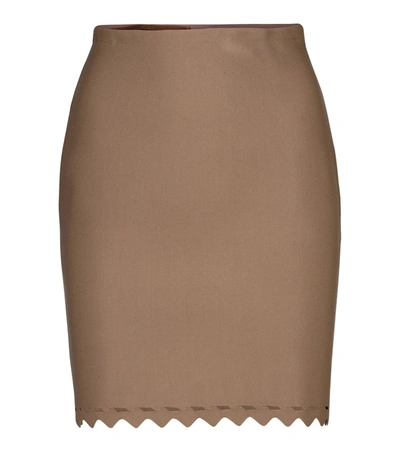 Shop Alaïa Laser-cut Stretch-knit Miniskirt In Beige