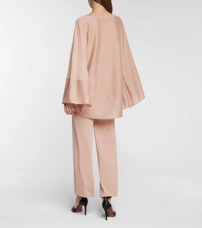 Shop Alaïa Cashmere And Silk Poncho In Pink