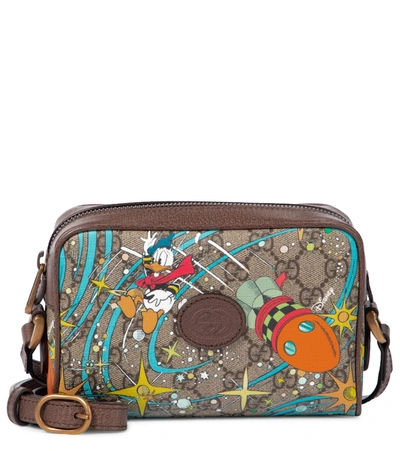 Shop Gucci X Disney® Printed Gg Camera Bag In Beige