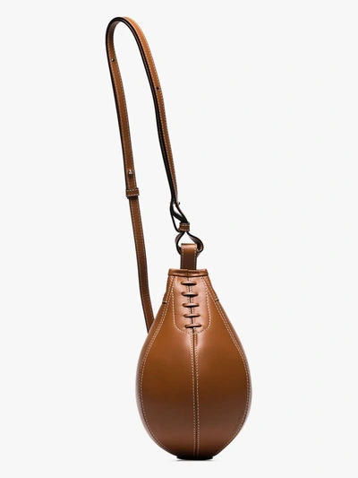 Shop Jw Anderson Small Punch Crossbody Bag In Brown