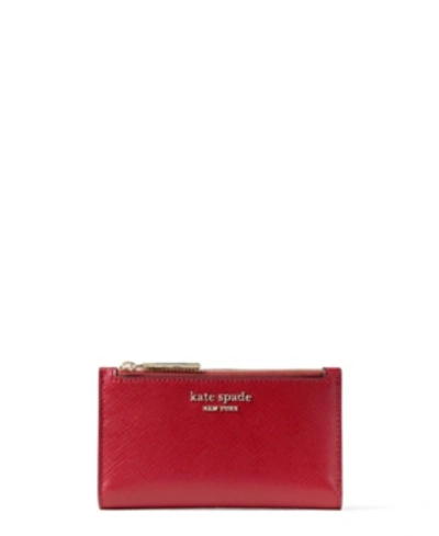 Shop Kate Spade New York Spencer Small Slim Bifold Wallet In Red Currant