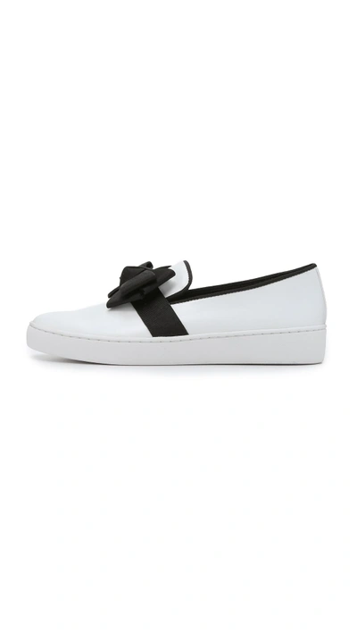 Shop Michael Kors Val Bow Sneakers In Optic White