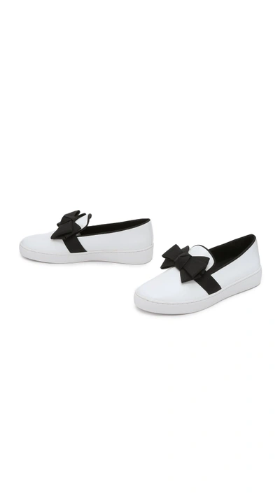 Shop Michael Kors Val Bow Sneakers In Optic White