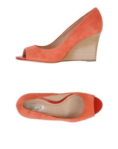 Shop Tod's Pumps In Salmon Pink