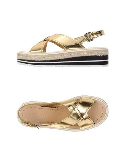 Shop Prada Sandals In Gold