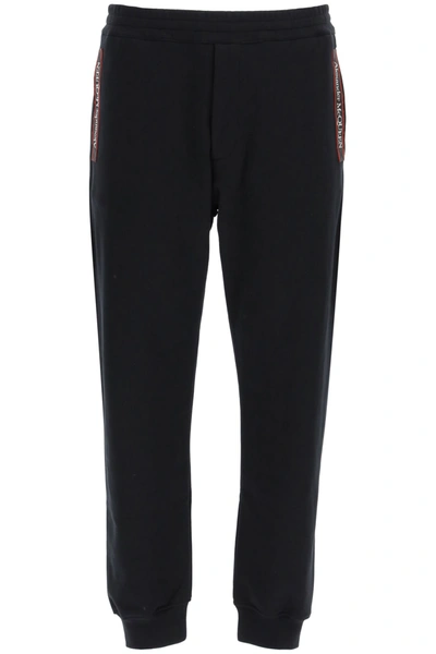Shop Alexander Mcqueen Sweatpants With Logo Selvedge In Black (black)