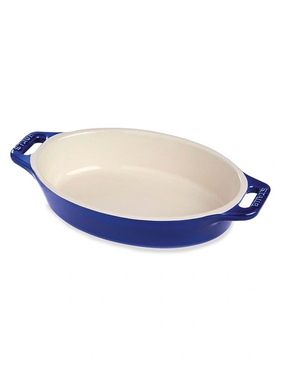 Shop Staub 11" Oval Stoneware Baking Dish In Dark Blue