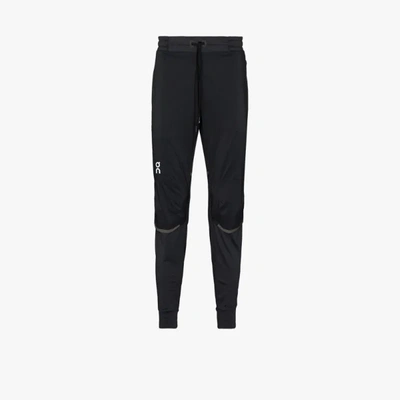 Shop On Running Running Track Pants In Black