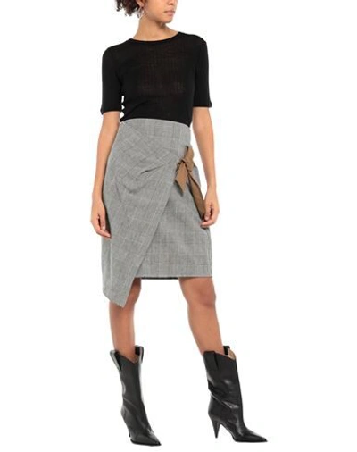 Manila Grace Midi Skirts In Black