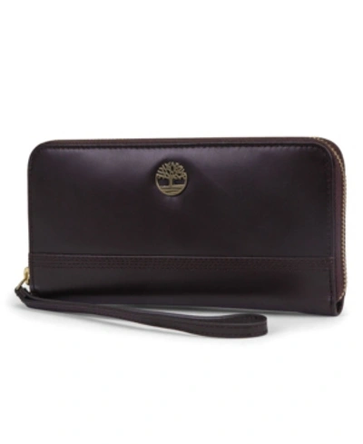 Shop Timberland Zip Around Wallet With Wristlet Strap In Brown