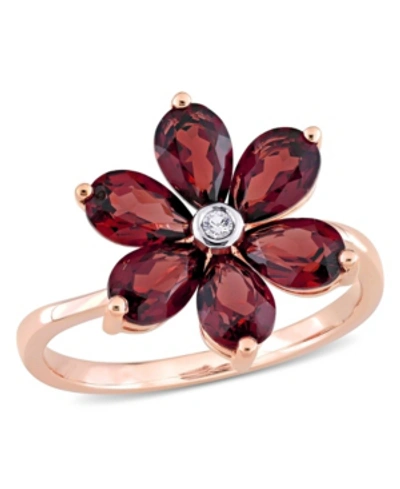 Shop Macy's Garnet And Diamond Accent Floral Ring In Red