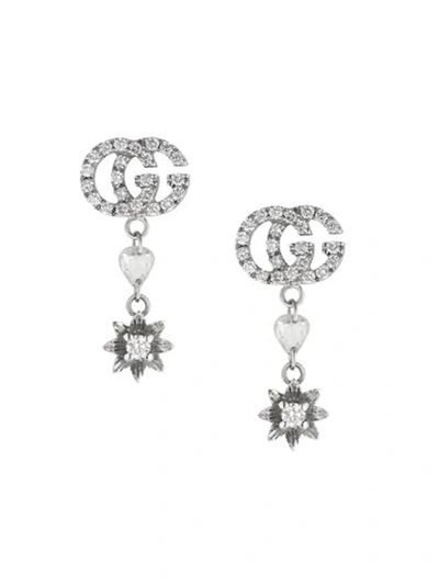 Shop Gucci Flora Gg Drop Earrings In Silver