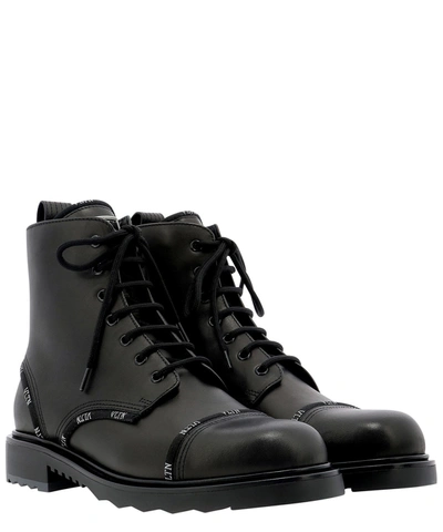 Shop Valentino "vlnt" Combat Boots In Black  