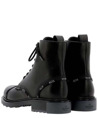 Shop Valentino "vlnt" Combat Boots In Black  