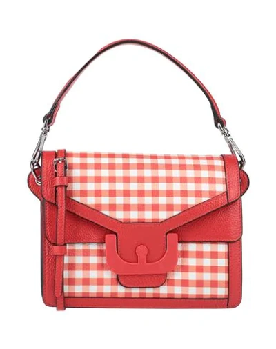 Shop Coccinelle Handbags In Red