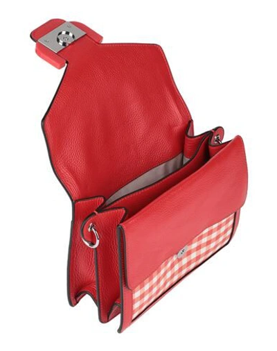Shop Coccinelle Handbags In Red