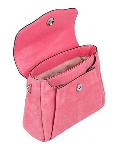 Shop Coccinelle Handbags In Pink