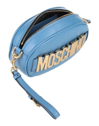 Shop Moschino Bum Bags In Pastel Blue