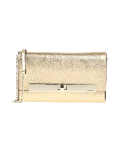 Shop Coccinelle Handbags In Gold