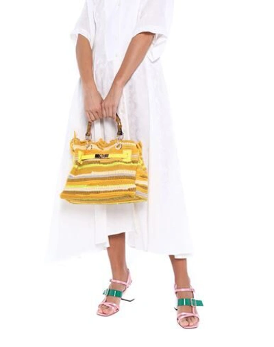 Shop Mia Bag Handbags In Yellow