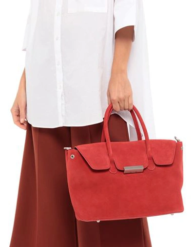 Shop Mia Bag Handbags In Red