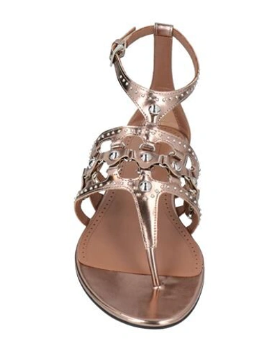 Shop Alaïa Toe Strap Sandals In Copper