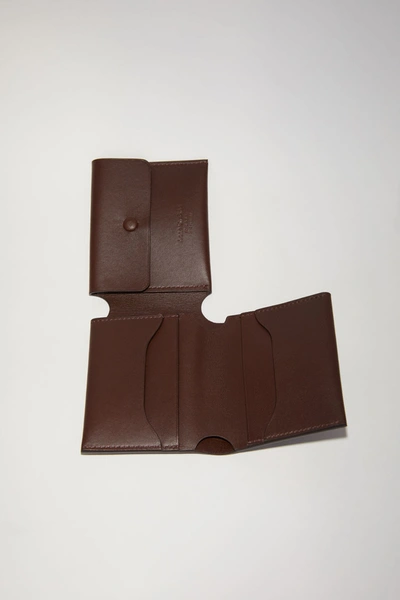 Shop Acne Studios Trifold Card Wallet In Dark Brown