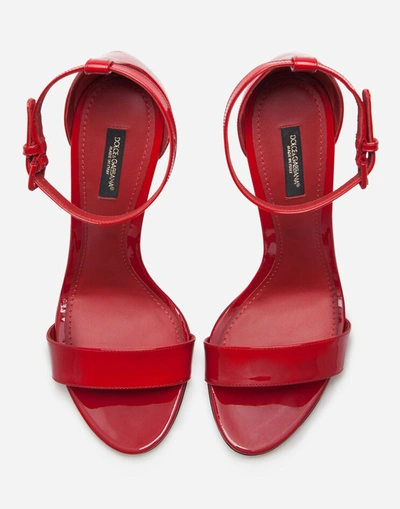 Shop Dolce & Gabbana Patent Leather Sandals With Dg Heel In Red