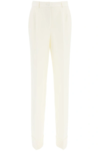 Shop Dolce & Gabbana Flare Wool Trousers In Bianco Naturale (white)