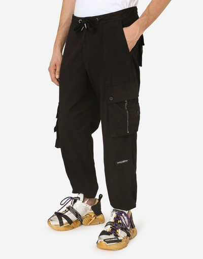 Shop Dolce & Gabbana Garment-dyed Stretch Cotton Jogging Pants In Black