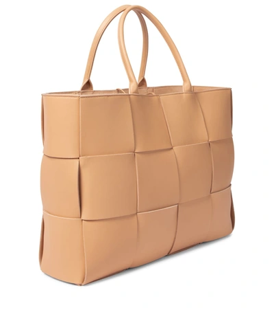 Shop Bottega Veneta Arco Medium Leather Tote In Beige