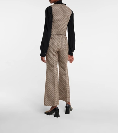 Shop Gucci G Jacquard High-rise Flared Wool Pants In Brown