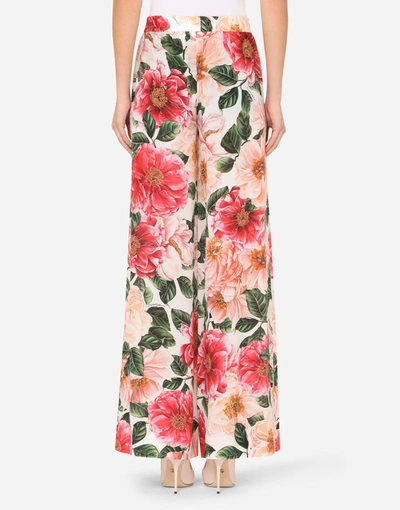 Shop Dolce & Gabbana Flared Pants In Camellia-print Crepe De Chine In Multicolor