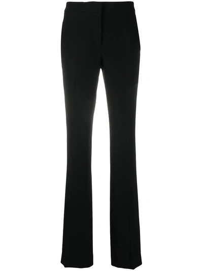 Shop Moschino High-waisted Flared Trousers In Black