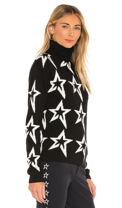 Perfect Moment Star Dust Intarsia Merino Wool Turtleneck Sweater In Black & Snow White Star