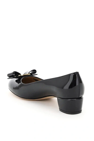 Shop Ferragamo Patent Vara Pumps In Black