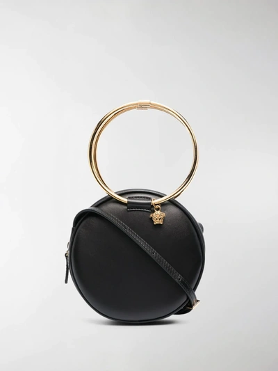 Shop Versace Round Leather Crossbody Bag In Black