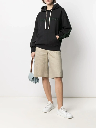 Shop Jw Anderson Embroidered-logo Drawstring Hoodie In Black