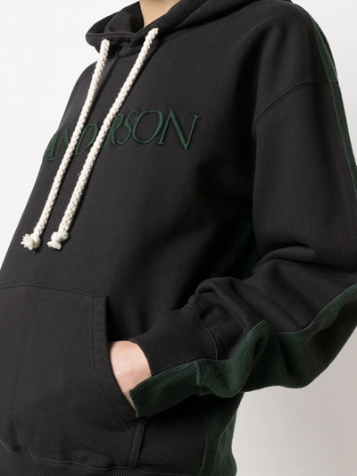 Shop Jw Anderson Embroidered-logo Drawstring Hoodie In Black
