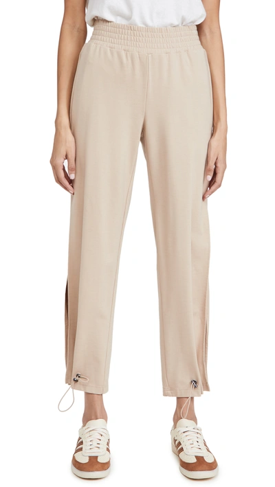 Shop Alice And Olivia Miami Side Slit Joggers In Nude