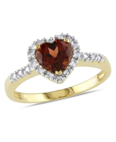 Shop Macy's Garnet And Diamond Halo Heart Ring In Red