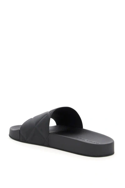 Shop Bottega Veneta The Slider Sandals In Black