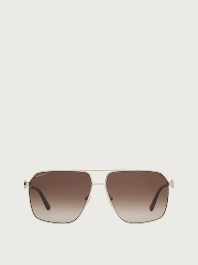 Shop Ferragamo Sunglasses In Shiny Gold